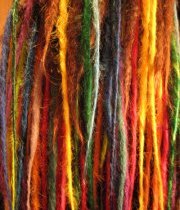 Girl with Beads and Sleeves in her Dreadlocks